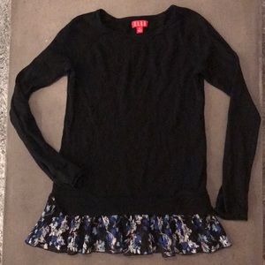 Elle longsleeve with pleated floral hem.